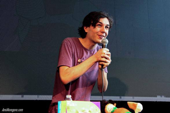 Minindo performs on stage