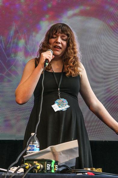 livvy94 on stage performing