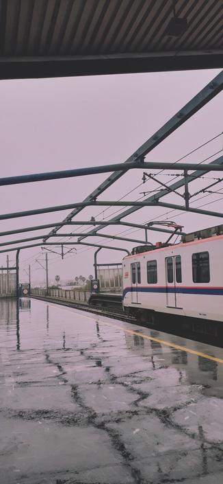 Above ground metro, with a cloudy day, Monterrey México. Pink filter.