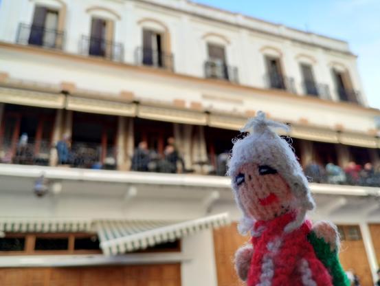 Puppet overjoyed in front of the Hotel Fuentes in Tangier.