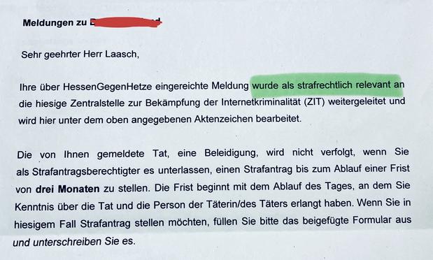 A printed letter addressed to "Herr Laasch" regarding a report submitted to "HessenGegenHetze," indicating it has been referred to the Central Office for Combating Internet Crime. It mentions the report is considered criminally relevant.