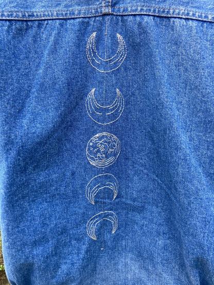 Vintage jean jacket customised with witchy embroidery on the back. Moon phases in silver thread.