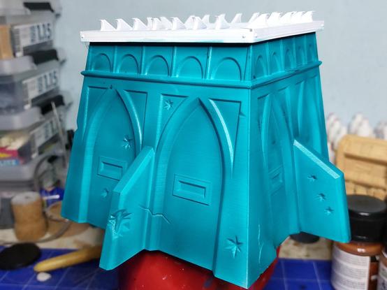Slightly 40k-ish bunker with pointed arches, sprayed turquoise with a white primer top that'll be rusty and orange soon