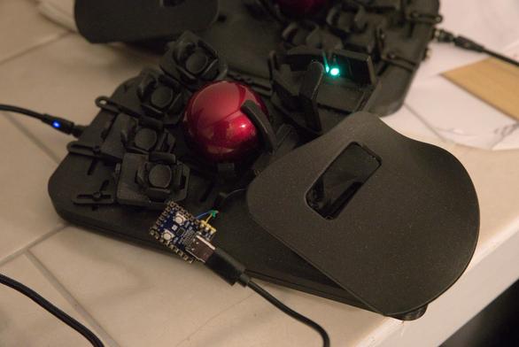 The left side of my Svalboard connected to an RP2040-Zero using Raspberry Pi's debugprobe firmware, for use with probe-rs.