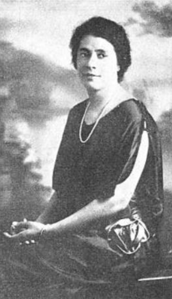 Camille Cohen Jones, undated photo from a 1929 issue of The Crisis; a Black woman with light skin and dark hair, wearing a dark flowing dress, hands in her lap