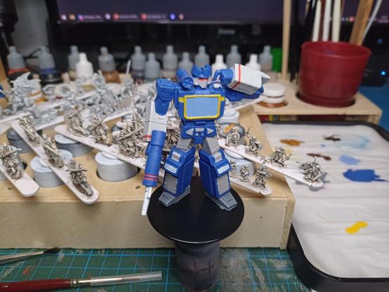 Partially painted Soundwave transformers miniature. Rfront side view
