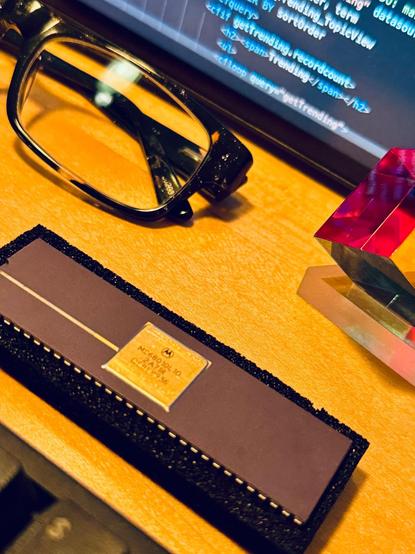 Motorola 68010L10 CPU (ceramic with gold) sitting on a desk