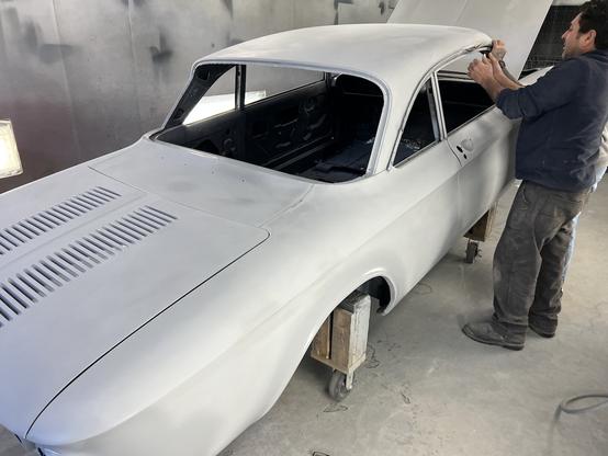 1964 Corvair in primer, preparing for final bodywork