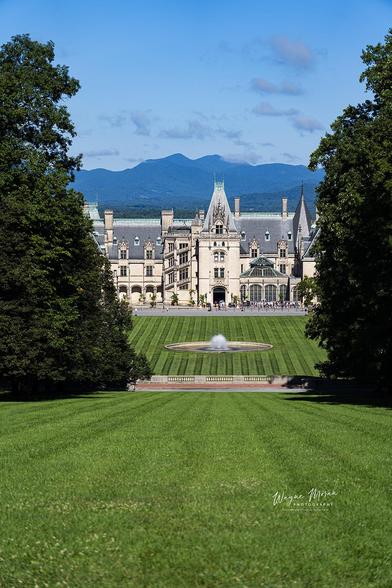 Biltmore Estate Ashville North Carolina

Nestled in the picturesque Blue Ridge Mountains of Asheville, North Carolina, the Biltmore Estate stands as a testament to America’s Gilded Age—a period marked by rapid economic growth and extravagant displays of wealth. 

As the largest privately-owned home in the United States, this architectural marvel offers a window into the opulent lifestyle of the Vanderbilt family and continues to captivate visitors with its rich history, stunning design, and enduring impact on the community.

The Vanderbilt Family
The Biltmore Estate was the vision of George Washington Vanderbilt II, born into the prominent Vanderbilt family known for their vast wealth accumulated through railroads and shipping enterprises. George, the youngest son of William Henry Vanderbilt, was an intellectual with a passion for art, literature, and travel. 



Image:
https://fineartamerica.com/featured/summer-morning-biltmore-estate-ashville-north-carolina-far-horizontal-wayne-moran.html


Read more:
https://waynemoranphotography.com/blog/exploring-the-biltmore-estate-ashville-north-carolina/

#biltmore #historic #architecture #biltmoreestate #vanderbilt #ashville #northcarolina
#mountain #landscape #photography #travel #travelphotography

#AYearForArt #buyintoArt #fineart #art