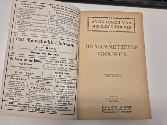 Titelpagina van deel Sherlock Holmes met advertenties op p. 2.
