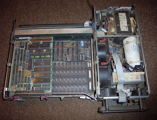 Some LSI-11 innards - Lots of chips, and a huge great capacitor just to hurt people who abuse the poor thing.