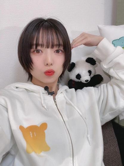 Fuuka with a panda plush on her shoulder.