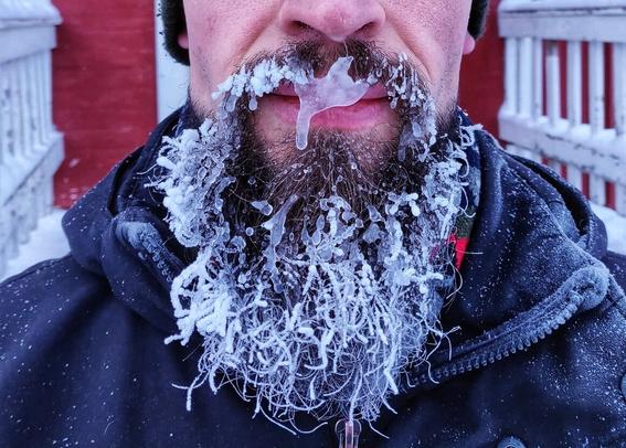My frosty beard on a cold day in front of our porch. The icy formation hanging from my moustache looks like the Puma logo upside down.