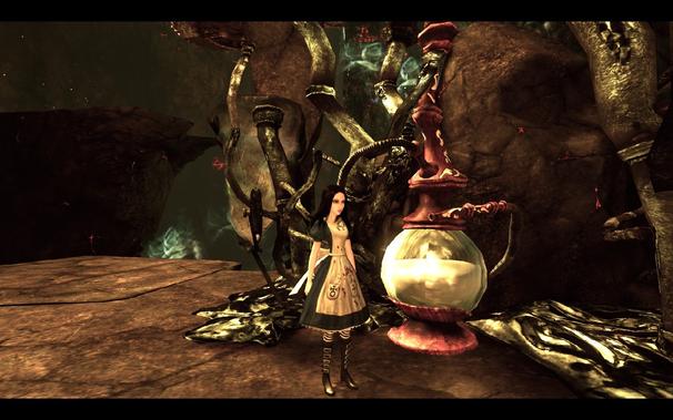 Alice stands next to a hookah. She's in for some fun times.