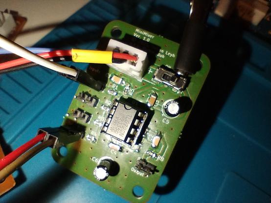 finished board with all components soldered in. two inputs and the power are connected.