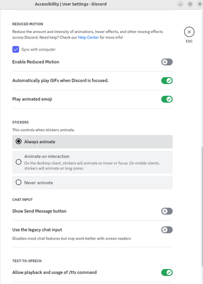 Screenshot of the discord desktop app settings: "Reduced motion. Reduce the amount and intensity of animations, hover effects, and other moving effects across Discord." There is a checked checkbox "sync with computer". The "enable reduced motion" toggle is disabled, the next two toggles are enabled: "Automatically play GIFs when Discord is focused" and "Play animated emoji". The next section "sticker control" has three options: "Always animate", "animate on interactivity" and "never animate".