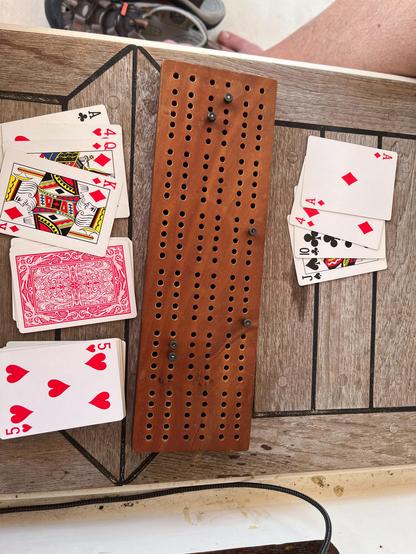 Two cribbage hands: one is A4QK, the other is A4JX. A starter of 5 gives identical scores to each other