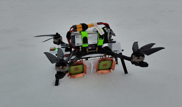 An image of a home-built drone with some weird antennas mounted underneath it.