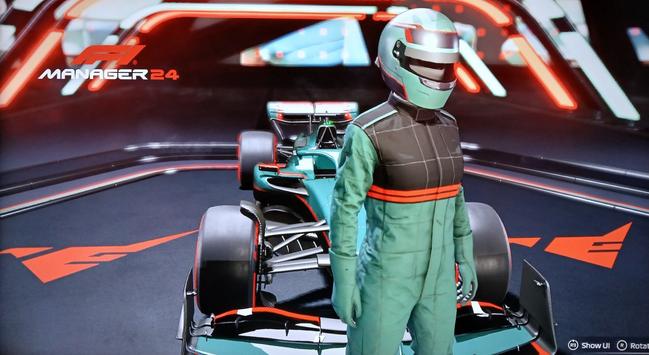 Screenshot of a driver's uniform in F1 Manager 24, modeled after the Asticassian school uniform, also in the school colors of grey-green and black with red highlights. The Asticassian school crest in red (a stylized bird) is seen in the background as the team logo.