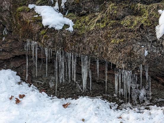 Nature made some icicle art on a cliff face