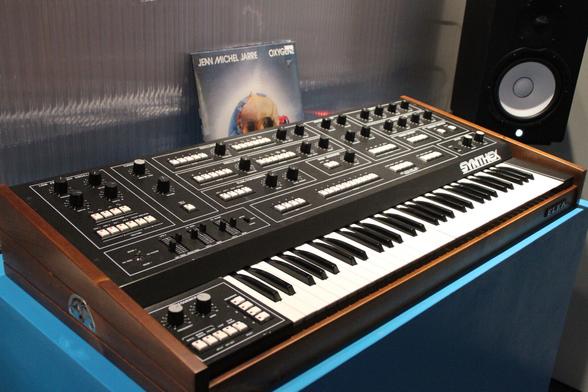 Elka Synthex Synthesizer, powered up and ready for hands on. Behind the synth, Jean Michel Jarre's "Oxygene" LP is on display.
