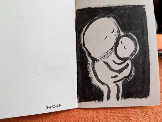 Petit cahier brut avec une série de dessins intuitifs et spontanés dessinés au feutre pinceau noir.