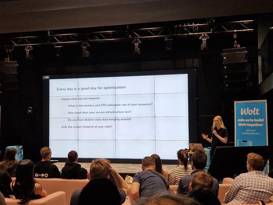 Magdalena presenting a slide titled "Every day is a good day for optimisation"