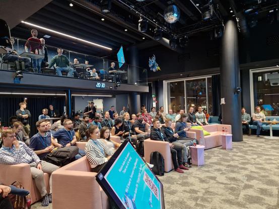 A view of the audience watching a talk.