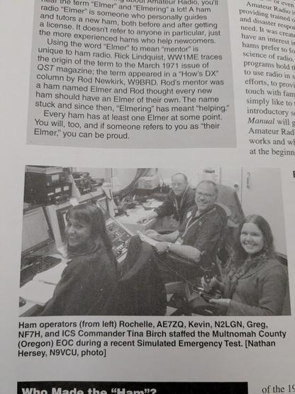 A black and white photo showing Ham operators (from left) Rochelle, AE7ZQ, Kevin, N2LGN, Greg, NF7H, and ICS Commander Tina Birch staffed the Multnomah County (Oregon) EOC during a recent Simulated Emergency Test. [Nathan Hersey, N9VCU, photo credit]