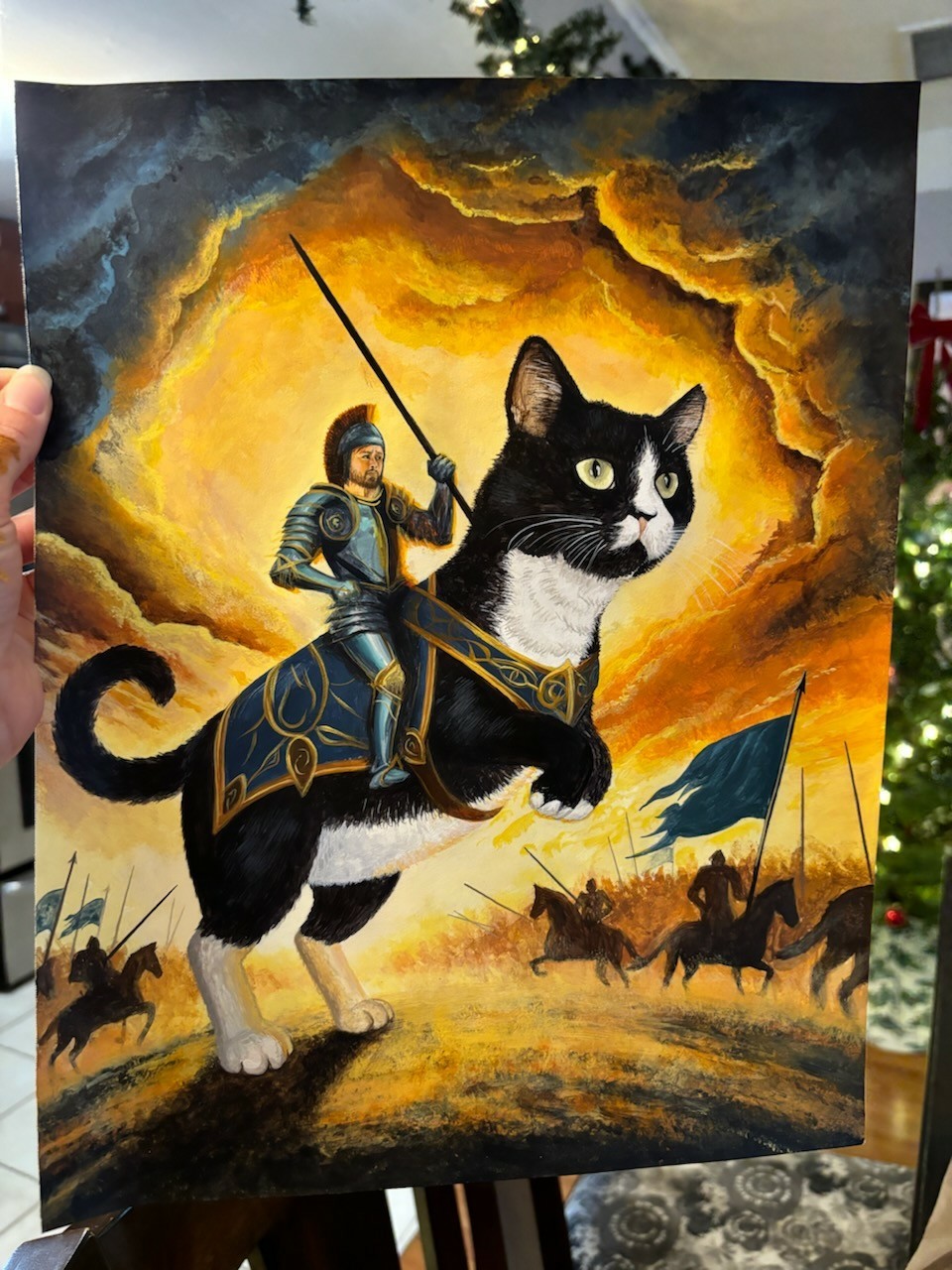 A painting of me in knight armor riding my tuxedo cat Fishy into battle, surrounded by other knights on horses under a glorious sky.