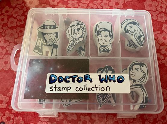 A plastic box labeled "Doctor Who Stamp Collection"
