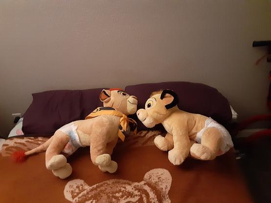Diapered Kion and Simba lion plushies
