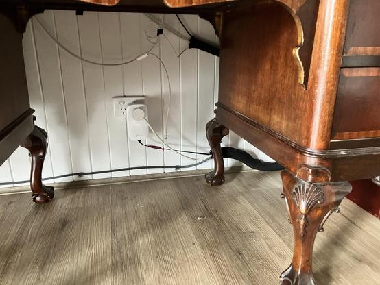 A clean space under a desk.This used to be dusty, cable-hazard madness. Now, not so much.