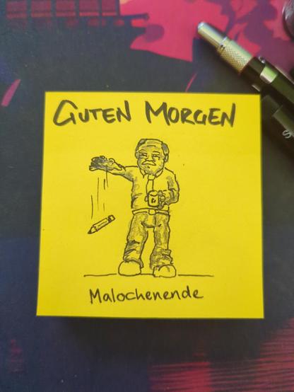 Auf einer gelben Haftnotiz steht "guten Morgen" darunter ist ein Büroarbeiter zu sehen der den Stift fallen lässt.
Schönes Malochenende!