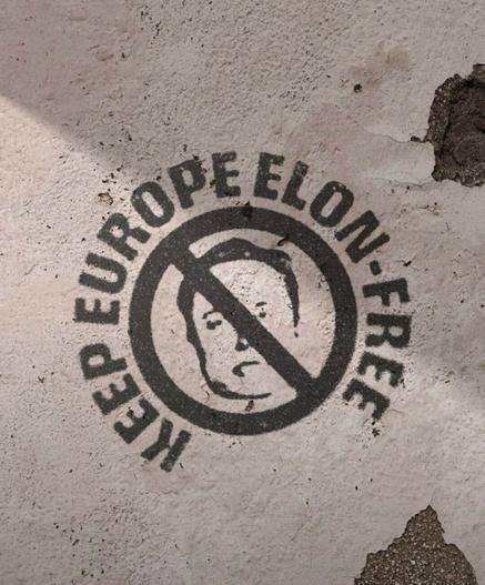 Street Art: Keep Europe Elon Free, with a face of a nazi called elon musk and a forbidden symbol