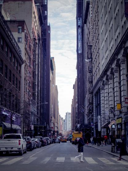 A New-York City street, buildings on each side.
