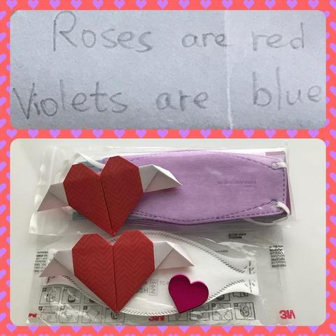 A photo collage which has a handwritten Roses are red Violets are blue poem in the top frame. In the bottom frame, at the top is a red origami heart with wings on top of a pack of lavender KN95 face masks while another red origami heart with wings and a heart sticker are on top of an individually wrapped white N95 respirator at the bottom.