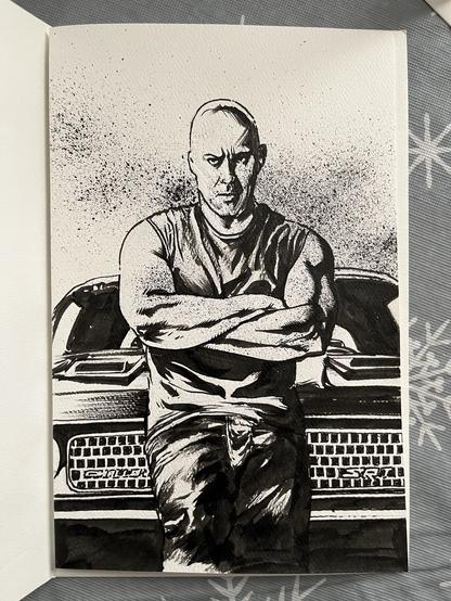 Vin Diesel standing in front of a Dodge Challenger