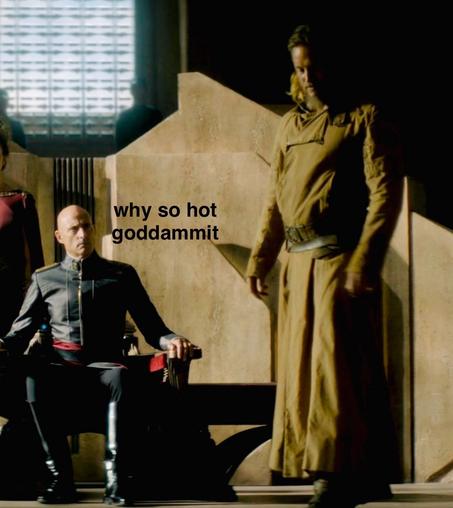 Javicco Corrino at the Landsraad, looking at Desmond Hart with the words "why so hot goddammit" next to him (Dune Prophecy)