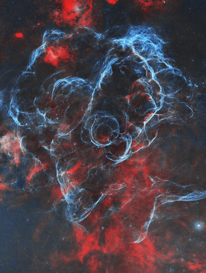 Astro image of a supernova remnant's knots and bubbling clouds of a bright and turbulent nebula.