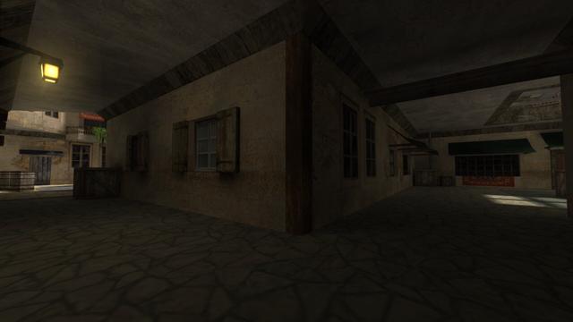 In this picture you can see the other side of the alley. So you can now see the illuminated lamp on the left and can now look left and right into a courtyard. This is on the map de_torn in the game Counter-Strike 1.6.