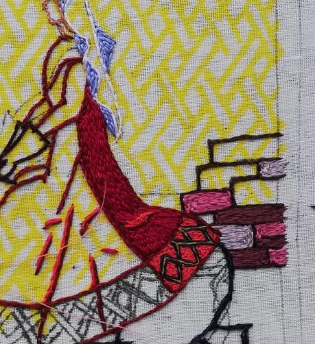 Close up of the start of work on Aethelflaed. The back panel of her dress and a few stones of the wall have been done.