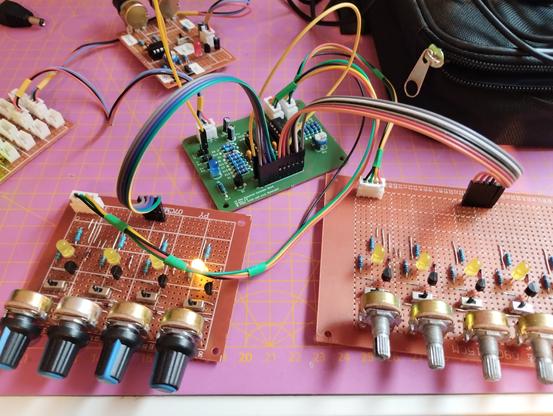 testing the board with a small setup. connected are the two control boards, the LFO for the clock, and the power supply.