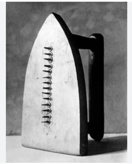 Man Ray. Iron with sharp metal points, down the middle of the iron, sticking out.