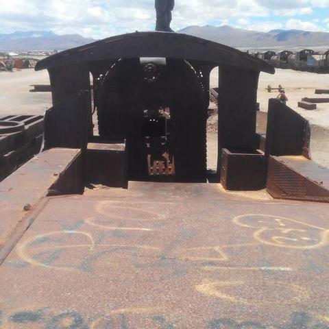 Photo taken on top of an abandoned locomotive it shows the driver room