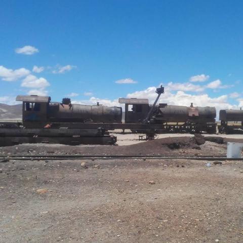 Photo of two abandoned locomotives one after the other