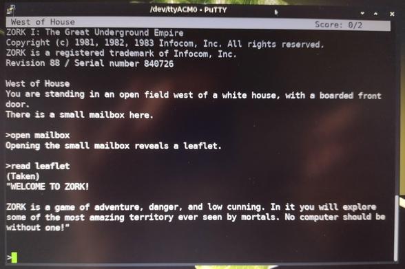 A PuTTY terminal window connected via the dev/ttyACM0 serial port to RunCPM on an RP2040 Pi Pico. Zork is running... Welcome to Zork!
