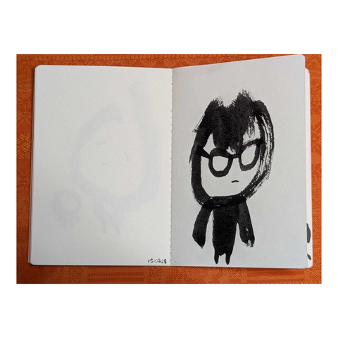 Autoportrait à lunettes naïf et enfantin au feutre pinceau.
