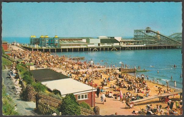 Printed colour postcard showing a view of the beach and pier at Clacton-on-Sea in Essex.
Published by D. Constance Limited, Littlehampton, No V.8295, c.1960s.
Postally unused.
Very good condition, with very slight corner bumps.