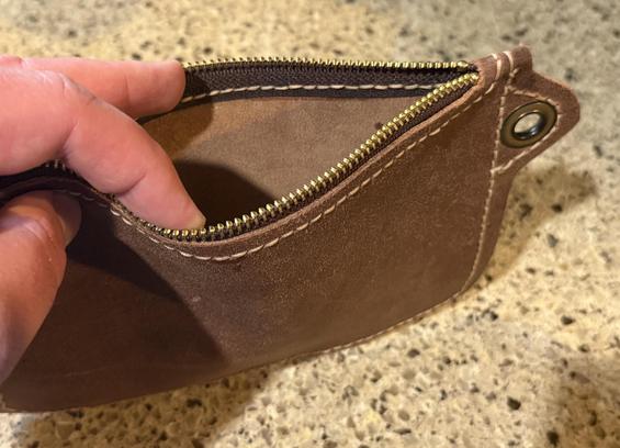 View of the pouch showing it unzipped and were looking in it
